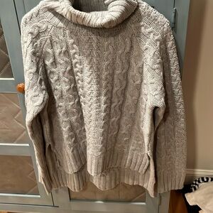 100% acrylic cable knit sweater size medium
High low style